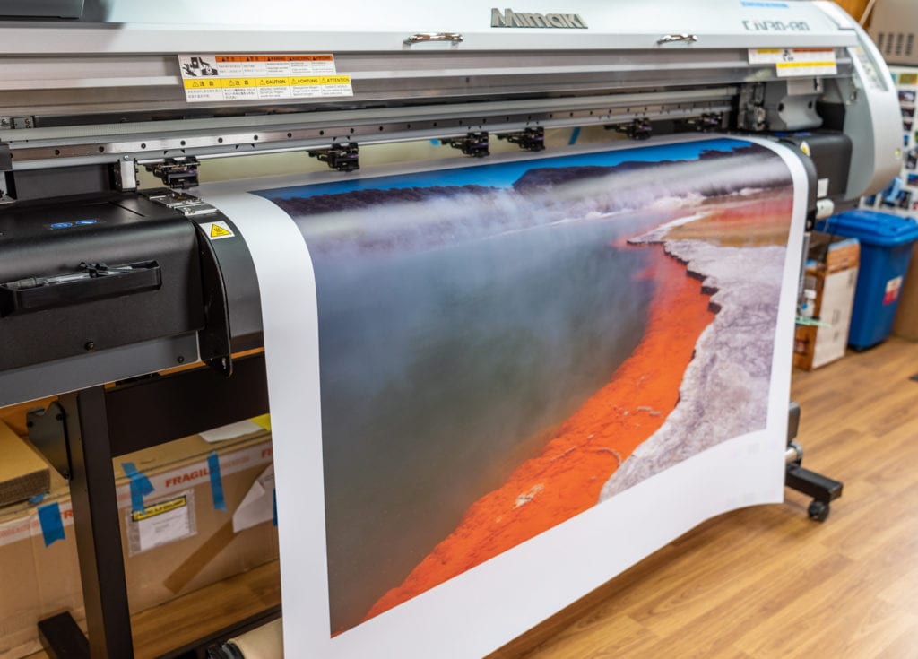 Printing your bespoke kitchen splashback on site at our glenorchy workshop. We use a wide format printer to print in 