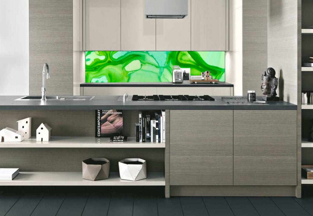 Green watercolour design as a splashback pattern in a modern kitchen